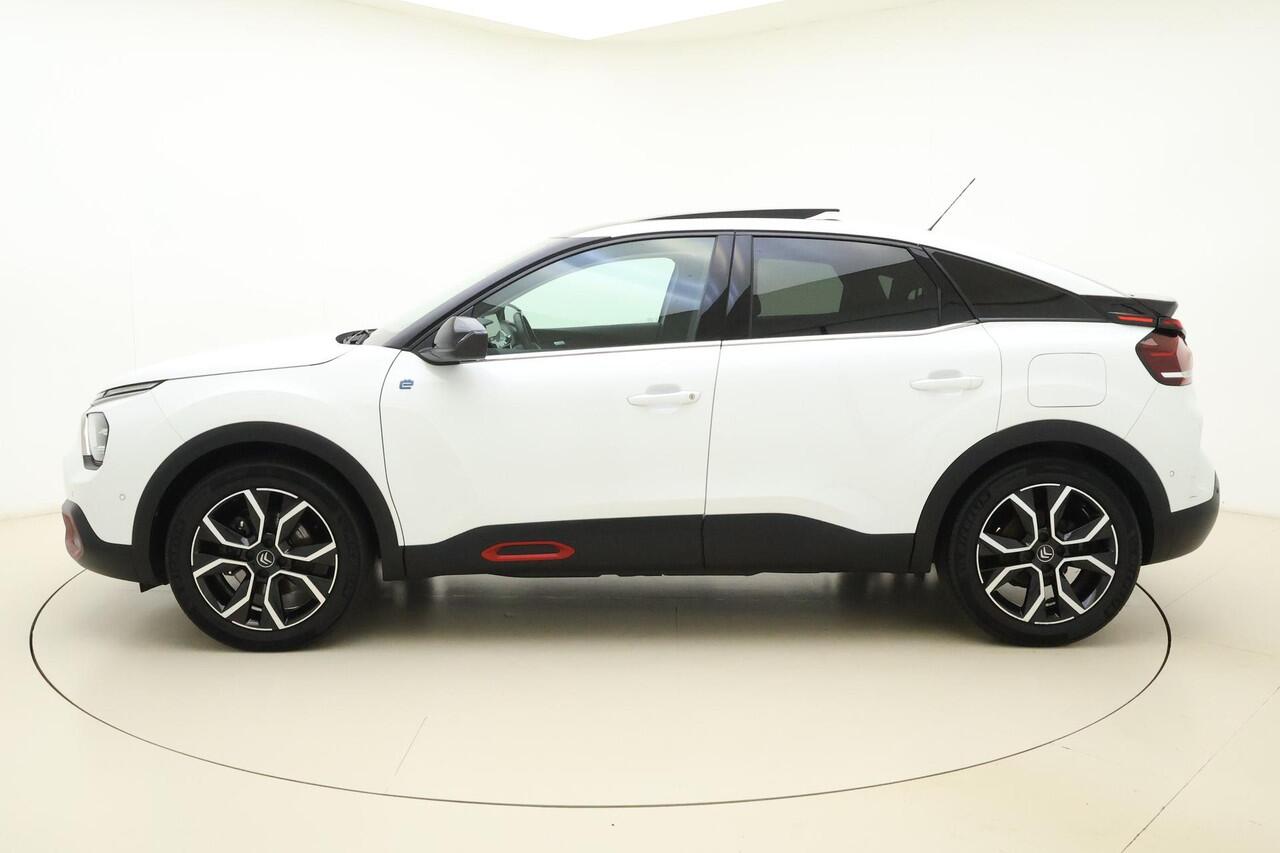 Citroen ë-C4 Shine 50 kWh SOH 91,44% | Panoramisch schuif/kanteldak | Navigatie | Lederen bekleding | Stoelverwarming | Camera | Keyless | Climate control | Verwarmd voorruit
