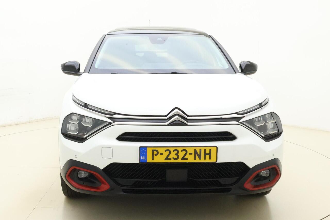 Citroen ë-C4 Shine 50 kWh SOH 91,44% | Panoramisch schuif/kanteldak | Navigatie | Lederen bekleding | Stoelverwarming | Camera | Keyless | Climate control | Verwarmd voorruit