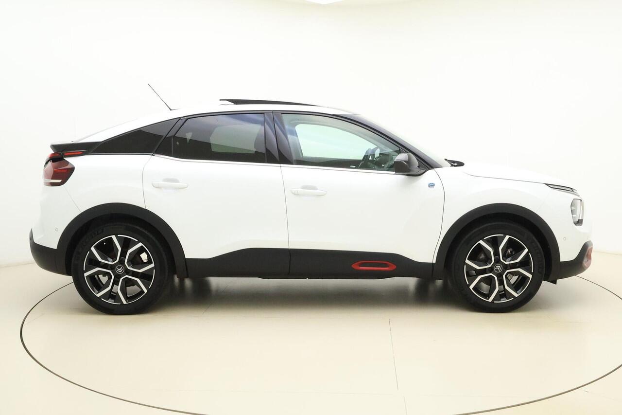 Citroen ë-C4 Shine 50 kWh SOH 91,44% | Panoramisch schuif/kanteldak | Navigatie | Lederen bekleding | Stoelverwarming | Camera | Keyless | Climate control | Verwarmd voorruit