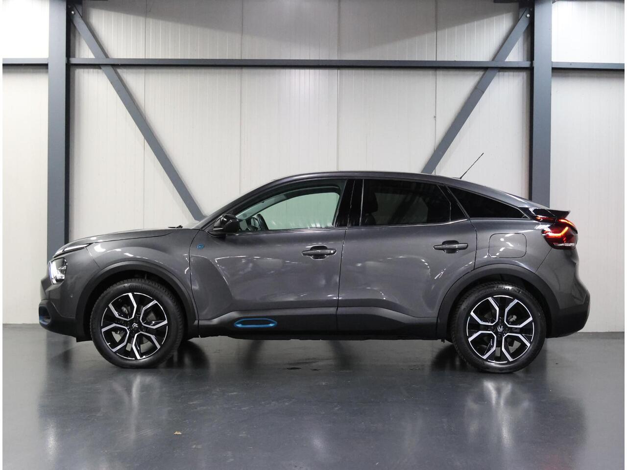 Citroen ë-C4 Shine 50kWh 136PK | 1ste eigenaar | 3 FASE | LEER | Winterpakket | Camera | LED lampen | AUTOMAAT | Navigatie | Isofix | Privacy Glass | Parkeersensoren | Stoelverwarming |