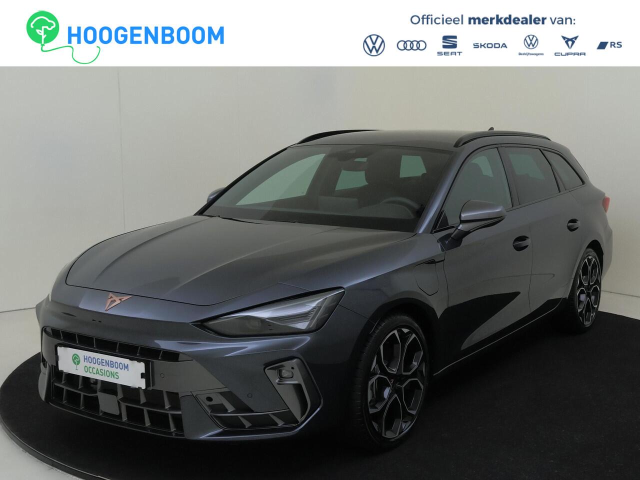 Cupra Leon Sportstourer 1.5 TSI e-Hybrid Business | Achteruitrijcamera | 3-zone airco | CarPlay | Keyless | Sfeerverlichting | Stuurwiel verwarmd | Voorklimatisering |