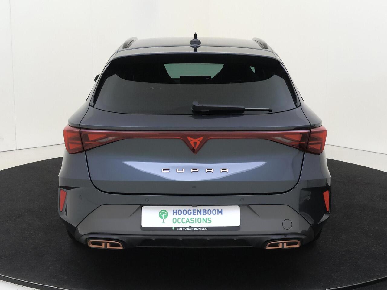 Cupra Leon Sportstourer 1.5 TSI e-Hybrid Business | Trekhaak | Kuipstoelen | Dodehoek detectie | Parkeerassistent | Keyless | Stoel- en stuurwielverwarming | Adaptieve cruise control | Achteruitrijcamera |