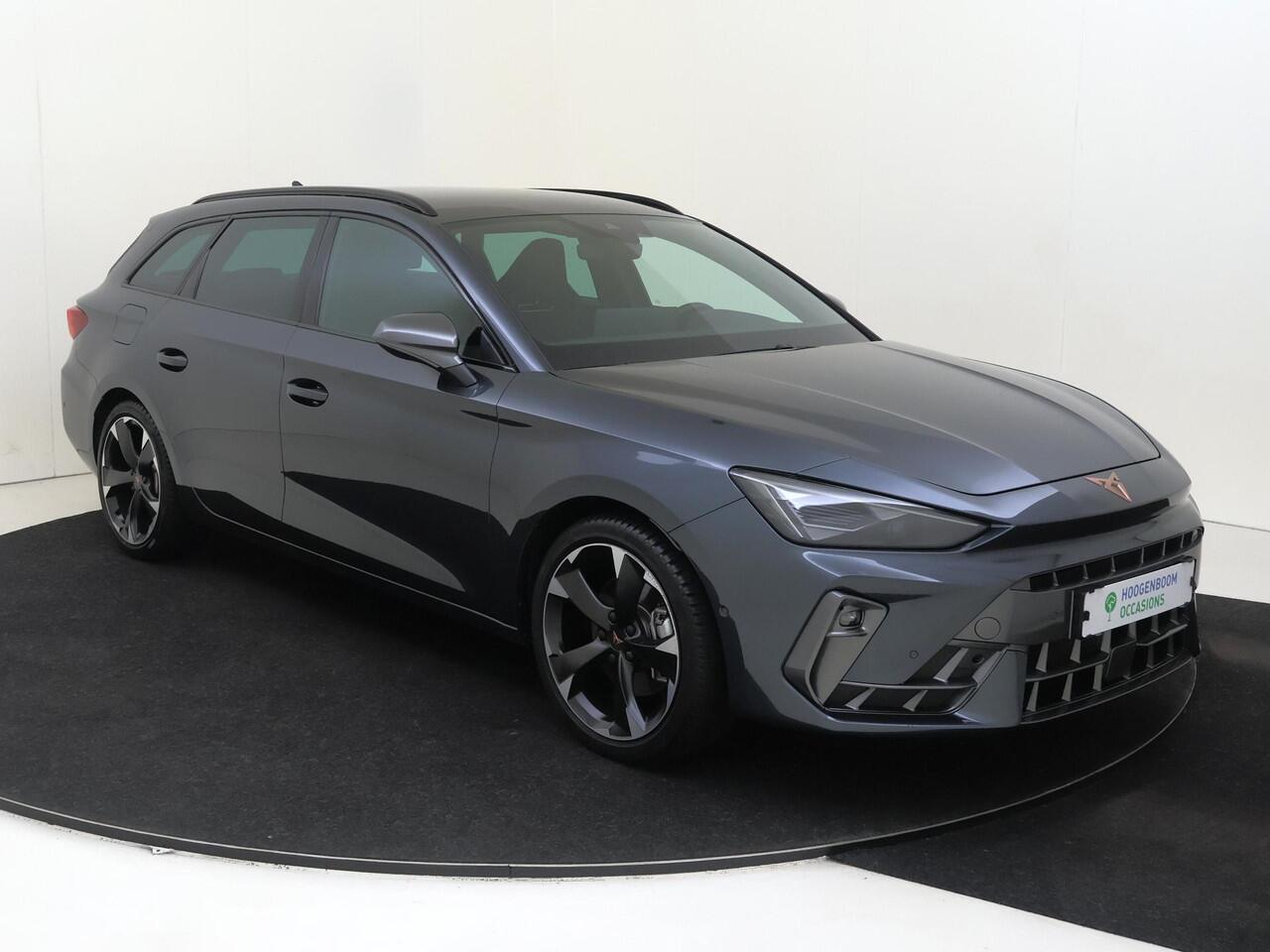 Cupra Leon Sportstourer 1.5 TSI e-Hybrid Business | Trekhaak | Kuipstoelen | Dodehoek detectie | Parkeerassistent | Keyless | Stoel- en stuurwielverwarming | Adaptieve cruise control | Achteruitrijcamera |