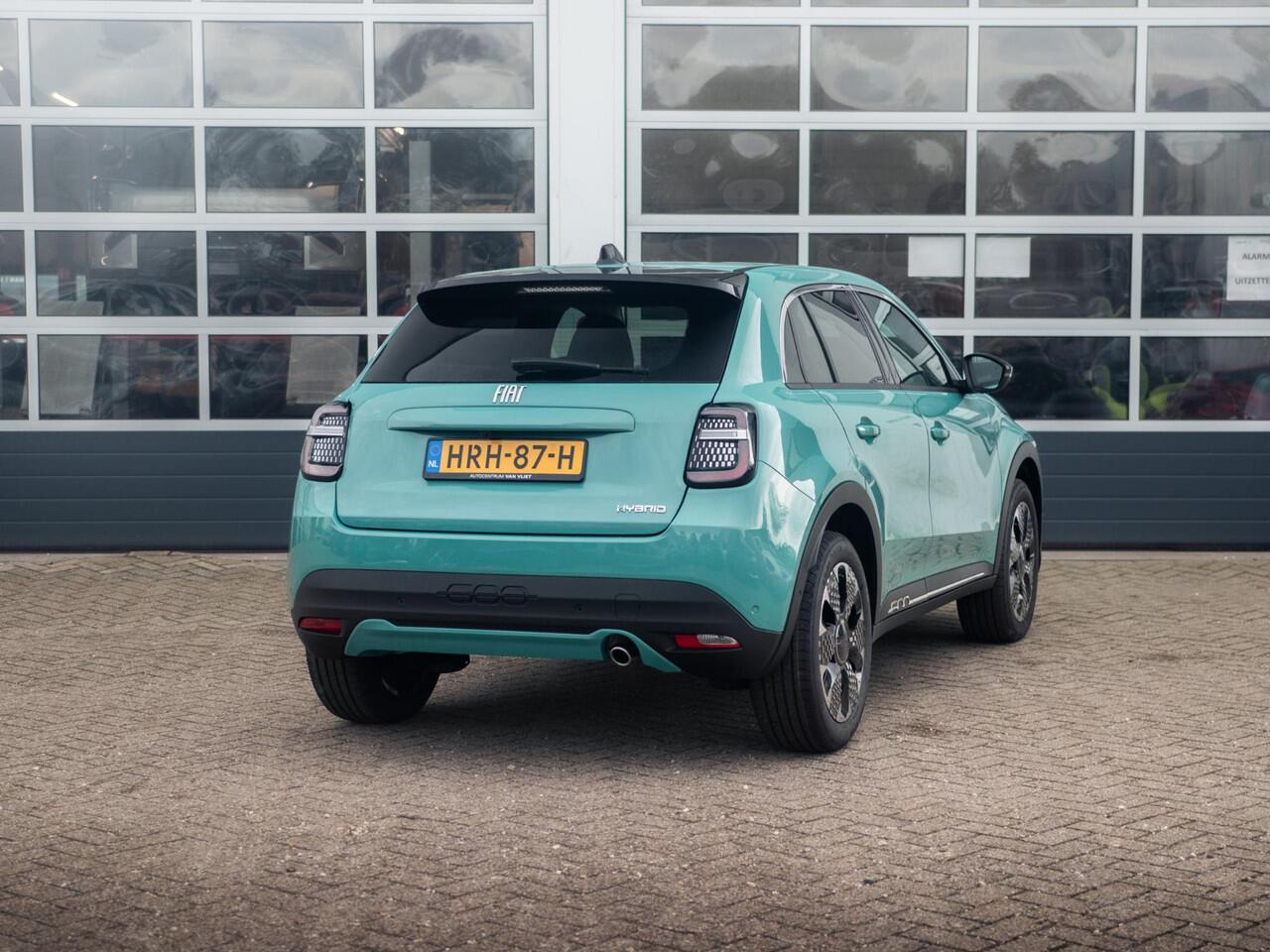 Fiat 600 1.2 Hybrid La Prima | Clima | Adapt. Cruise | Camera | BSM | 18" | Stoelverwarming | Apple Carplay | Elektr. A-Klep