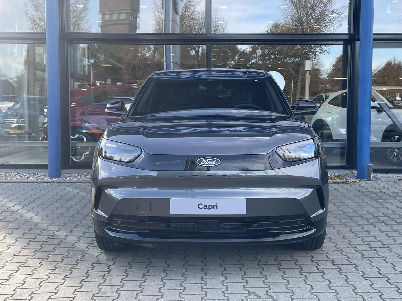Ford CAPRI Premium Extended Range RWD 77 kWh | ¤1500,- Voordeel ! | DIRECT LEVERBAAR | AGR Voorstoelen | Energiezuinige Warmtepomp |Driver Assistance Pack |