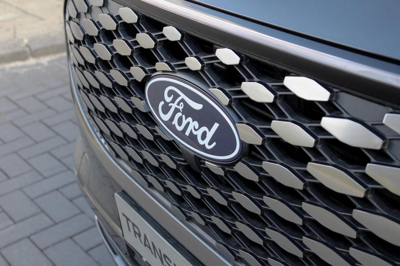 Ford E-Transit Cust. 320 L2H1 Limited 65 kWh 218pk | Zuid | | Inklapbare trekhaak | 17 inch lichtmetalen velgen (Carbonised Grey) | Driver Assistent Pack Premium | AGM accu | 3-fase laadkabel mode 3 32A, 10 meter | Centrale dubbele vergrendeling | Vehicle Integration Sy