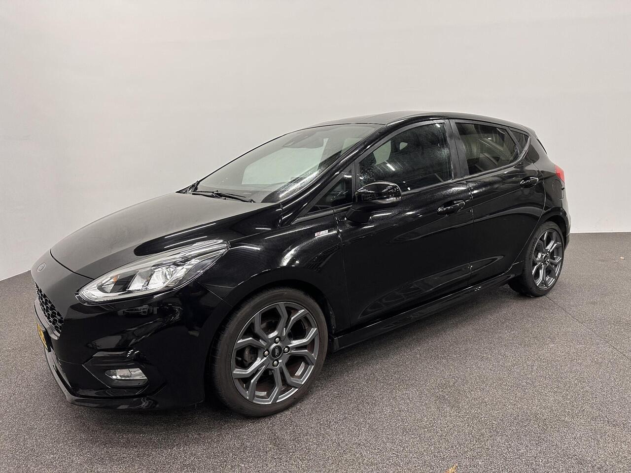 Ford FIESTA 1.0 EcoBoost ST-Line 125PK 6V Navigatie Full LED Carplay Parkeersensoren Cruise Control Stoel+Stuurverwarming Climate Control Privacy Glass 17" DAB+