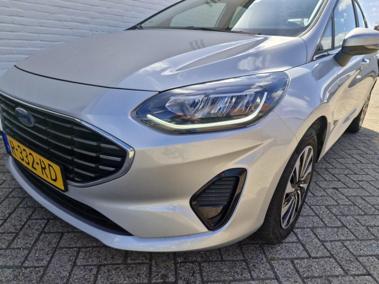 Ford FIESTA 100 pk Titanium | Navigatie | Keyless | Draadloze telefoonlader