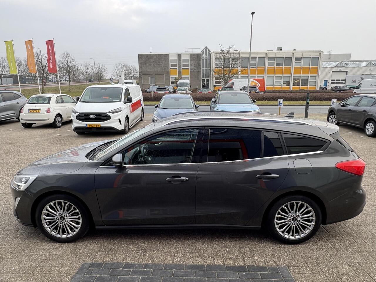 Ford FOCUS Wagon 1.0 EcoBoost Titanium Business | Winter pakket | Achteruitrijcamera | Cruise control adaptief | Dealer onderhouden |