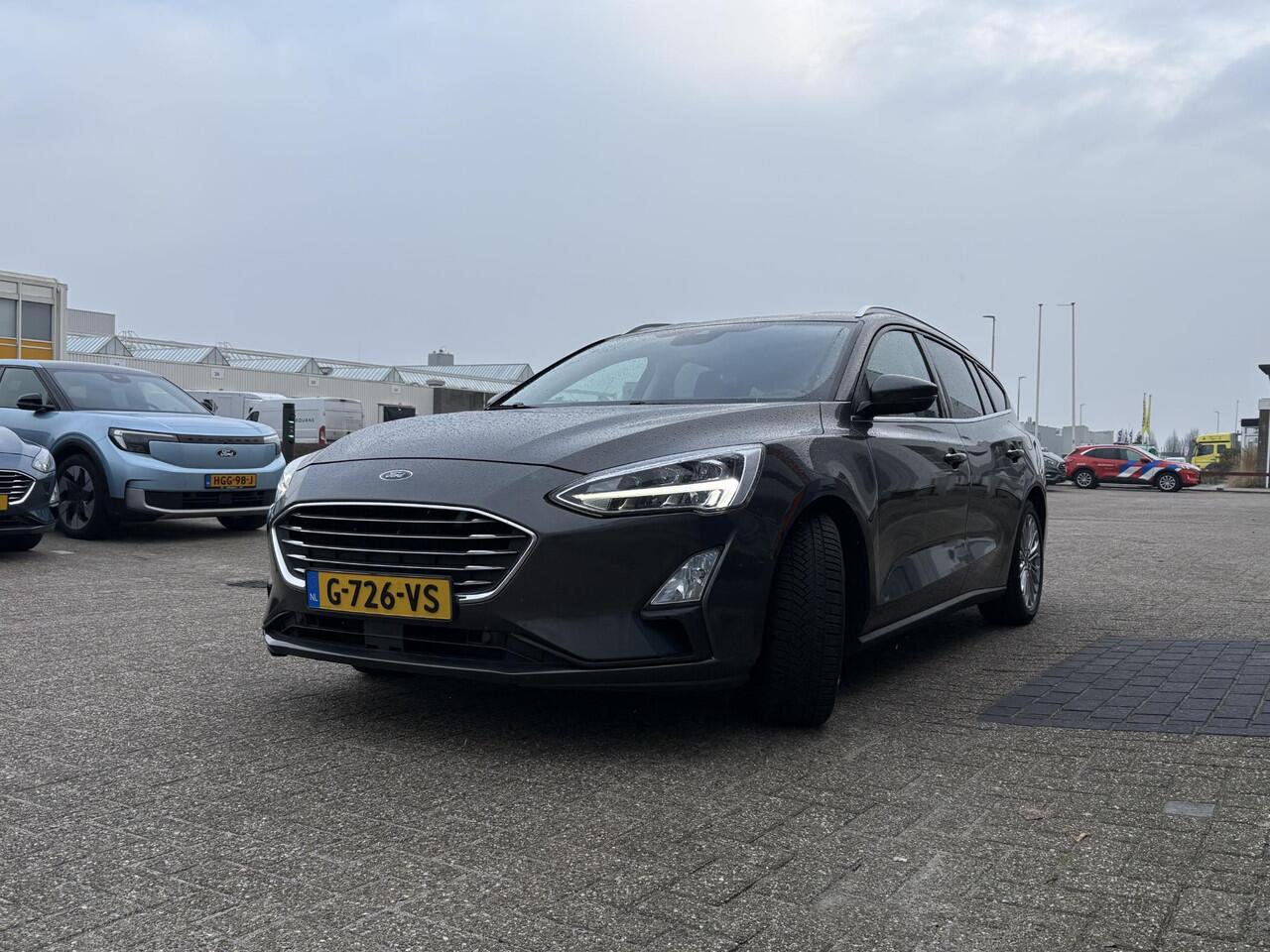 Ford FOCUS Wagon 1.0 EcoBoost Titanium Business | Winter pakket | Achteruitrijcamera | Cruise control adaptief | Dealer onderhouden |