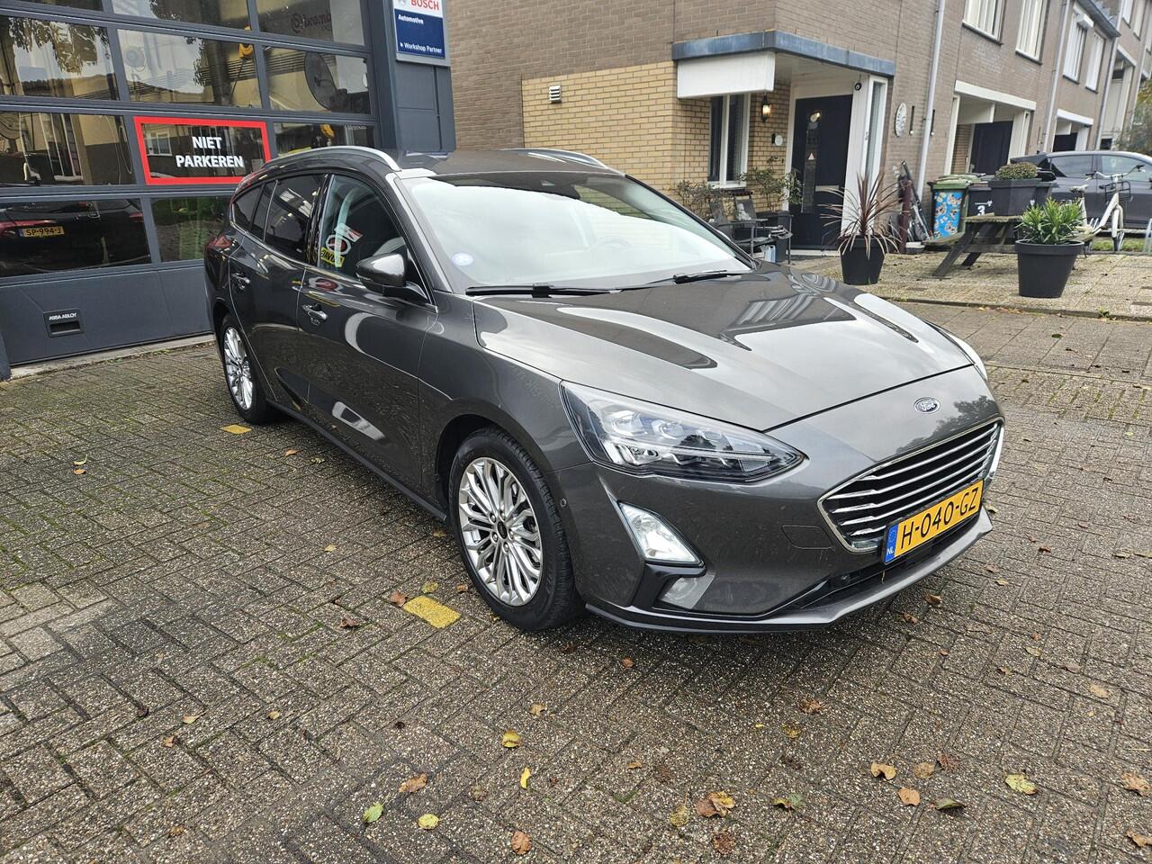 Ford FOCUS Wagon 1.0 EcoBoost Titanium Business / ADAP CRUISE/ NAVIGATIE/ APPLE CARPLAY/ LMV/ PDC/ CLIMA/ WINTERPACK/ CAMERA/ LED/ TREKHAAK