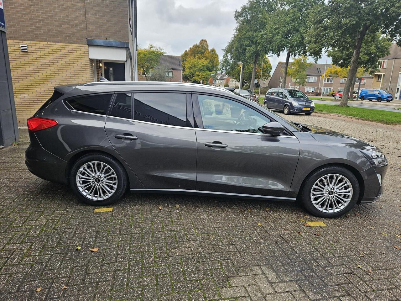 Ford FOCUS Wagon 1.0 EcoBoost Titanium Business / ADAP CRUISE/ NAVIGATIE/ APPLE CARPLAY/ LMV/ PDC/ CLIMA/ WINTERPACK/ CAMERA/ LED/ TREKHAAK