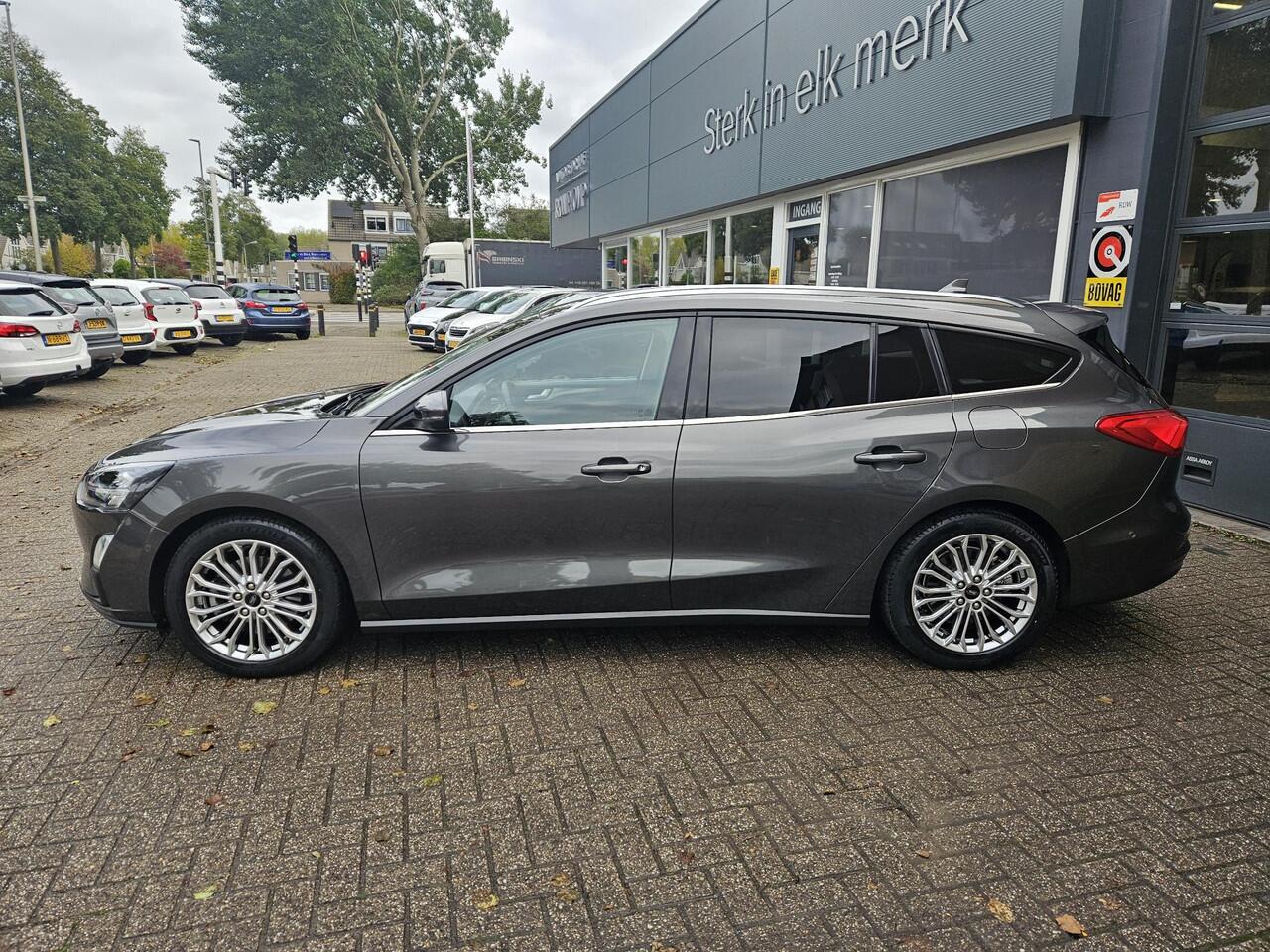 Ford FOCUS Wagon 1.0 EcoBoost Titanium Business / ADAP CRUISE/ NAVIGATIE/ APPLE CARPLAY/ LMV/ PDC/ CLIMA/ WINTERPACK/ CAMERA/ LED/ TREKHAAK