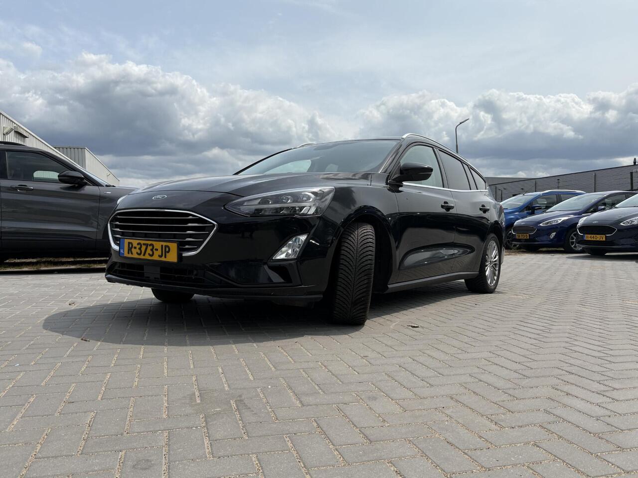 Ford FOCUS Wagon 1.0 EcoBoost Titanium Wagon | Winter Pack | Adaptive cruise control | Camera | Navigatie | 17 inch | Reservewiel