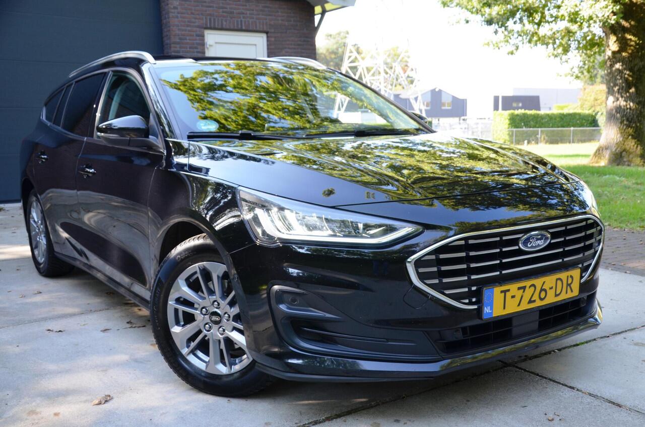 Ford FOCUS Wagon 1.0 EcoBoost Hybrid Titanium Navi/Pdc/Ecc/Led/Stoel Stuur & ruitverwarming/Leder/Cr-Controle/Privacy-Glass/Lmv/Achteruitrijcamera/Virtual Cockpit