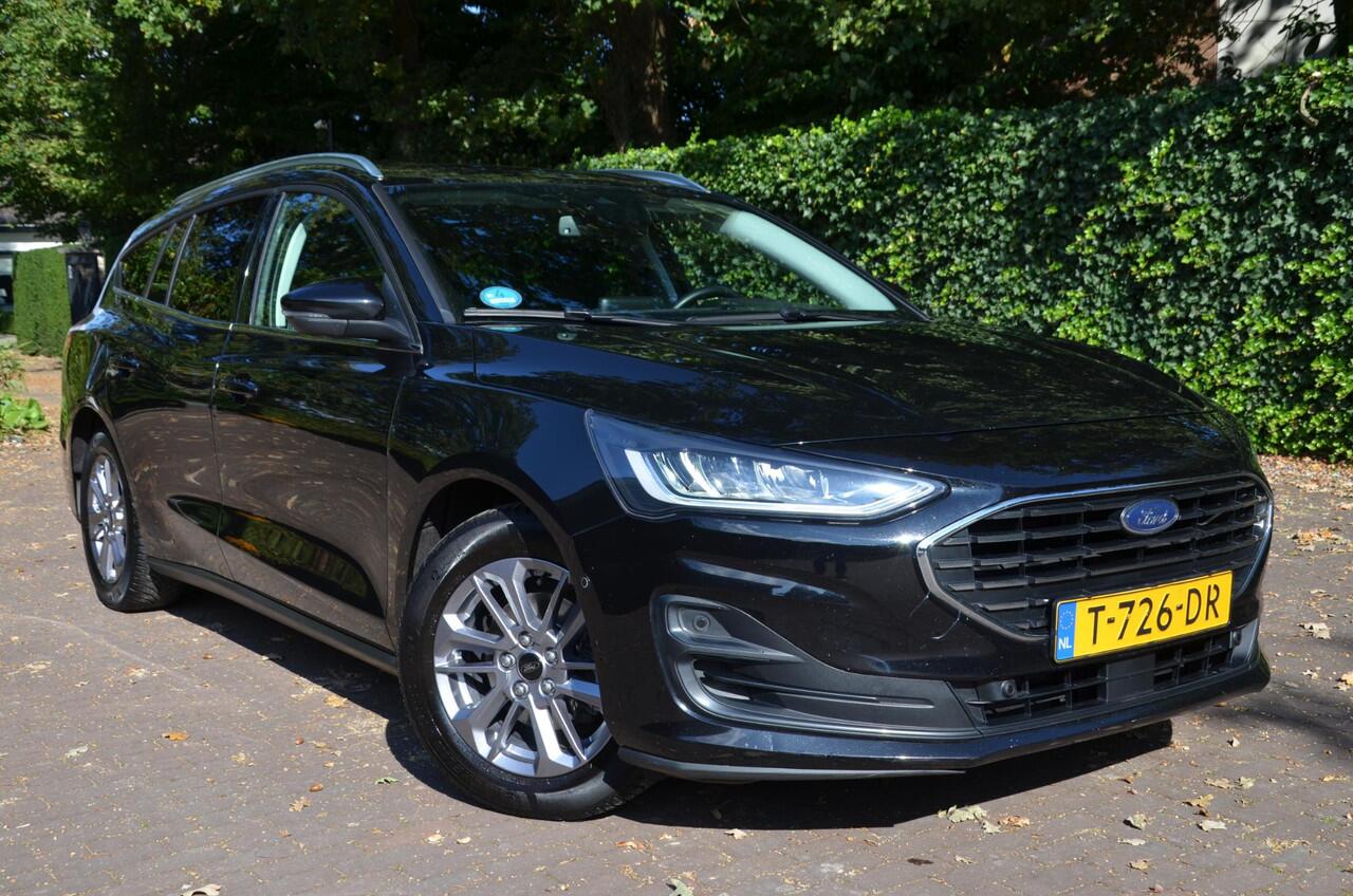 Ford FOCUS Wagon 1.0 EcoBoost Hybrid Titanium Navi/Pdc/Ecc/Led/Stoel Stuur & ruitverwarming/Leder/Cr-Controle/Privacy-Glass/Lmv/Achteruitrijcamera/Virtual Cockpit