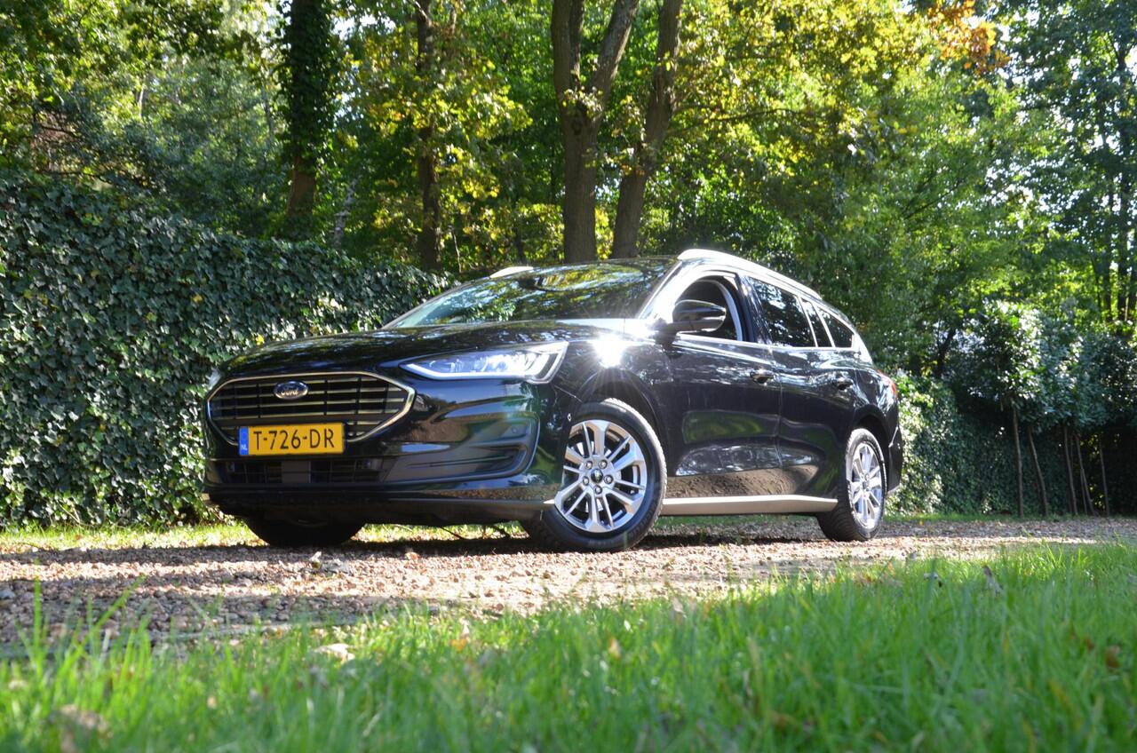 Ford FOCUS Wagon 1.0 EcoBoost Hybrid Titanium Navi/Pdc/Ecc/Led/Stoel Stuur & ruitverwarming/Leder/Cr-Controle/Privacy-Glass/Lmv/Achteruitrijcamera/Virtual Cockpit