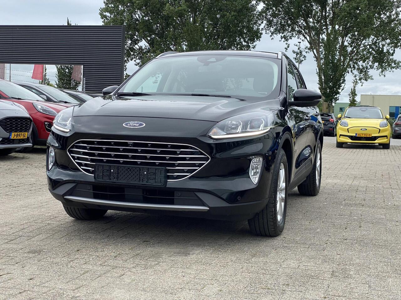 Ford KUGA 2.5 PHEV Titanium | zuid | 225pk | Driver Assistance Pack | Winterpack | 1.500kg Trekgewicht |
