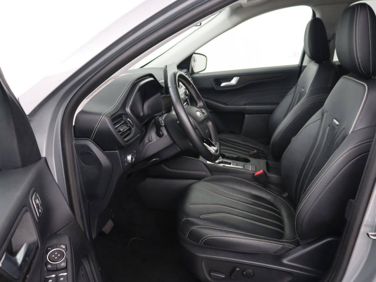 Ford KUGA 2.5 PHEV Vignale | Head-Up | Trekhaak | Adaptive cruise | Leder | 360 Camera | Stoelverwarming | Digital Cockpit | Carplay | Dodehoek detectie | Navigatie | Keyless | Achterbankverwarming | Plug In