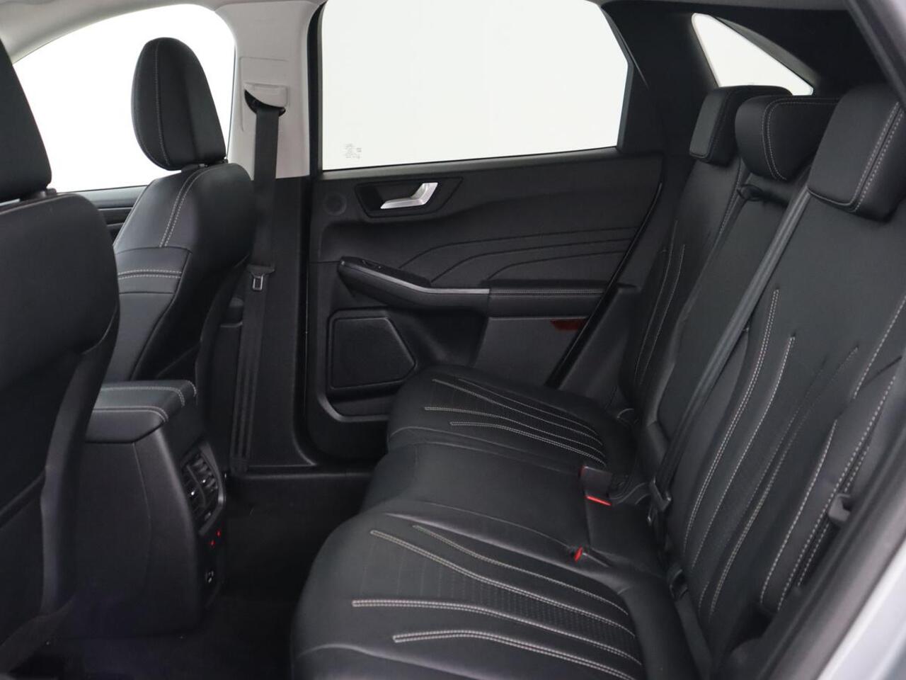 Ford KUGA 2.5 PHEV Vignale | Head-Up | Trekhaak | Adaptive cruise | Leder | 360 Camera | Stoelverwarming | Digital Cockpit | Carplay | Dodehoek detectie | Navigatie | Keyless | Achterbankverwarming | Plug In