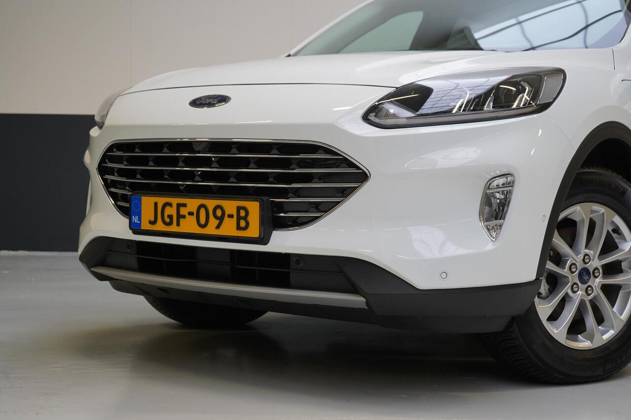 Ford KUGA 2.5 PHEV Titanium | Winter-pack | Adapt. Cruise | SoH 90% | Voorruitverwarming | Privacy Glass | Navigatie | Climate airco
