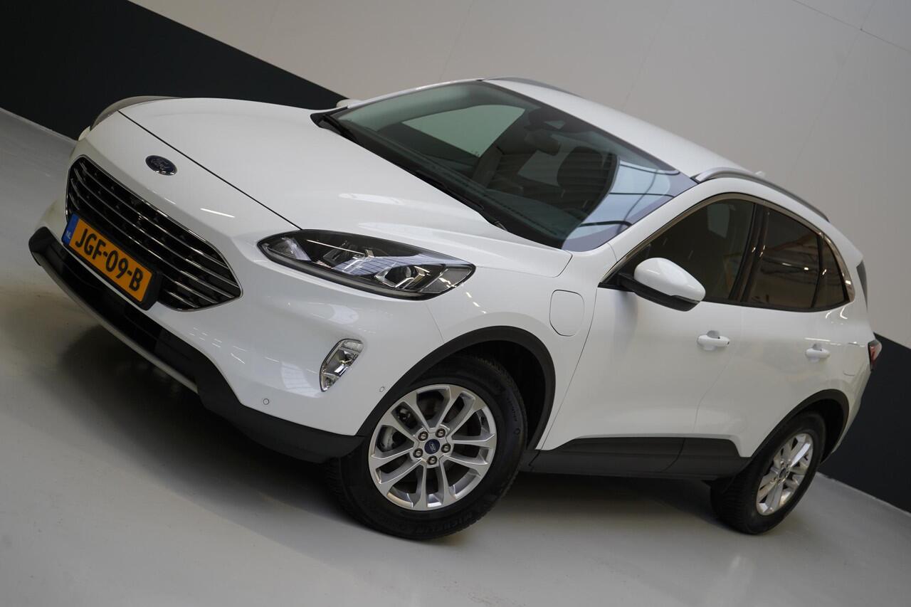 Ford KUGA 2.5 PHEV Titanium | Winter-pack | Adapt. Cruise | SoH 90% | Voorruitverwarming | Privacy Glass | Navigatie | Climate airco