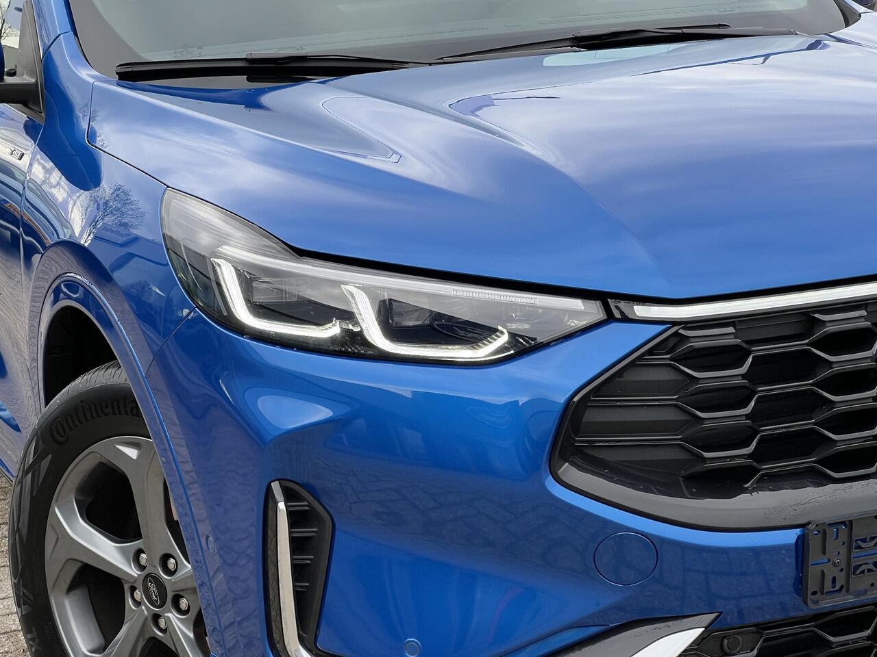 Ford KUGA 2.5 PHEV ST-Line X | 243pk | Zuid | Driver Assistance Pack | Winterpack | Wegklapbare Trekhaak | Technology Pack | Dessert Island Blue