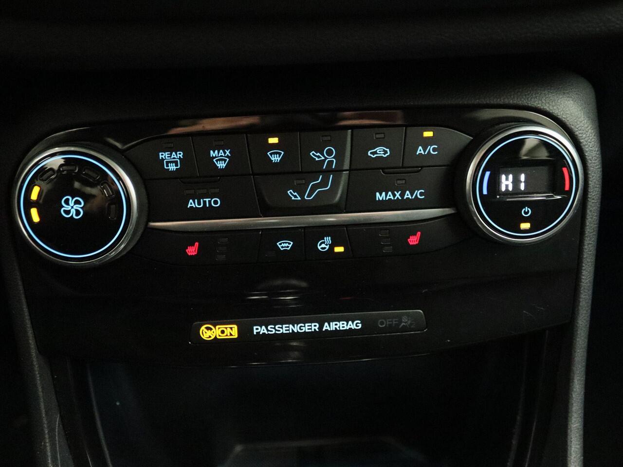 Ford PUMA 1.0 EcoBoost Hybrid Titanium | Navi | AppleCarplay/Android Auto | Parkeersensoren | Stoel+stuurverwarming | Climate control | Trekhaak! |