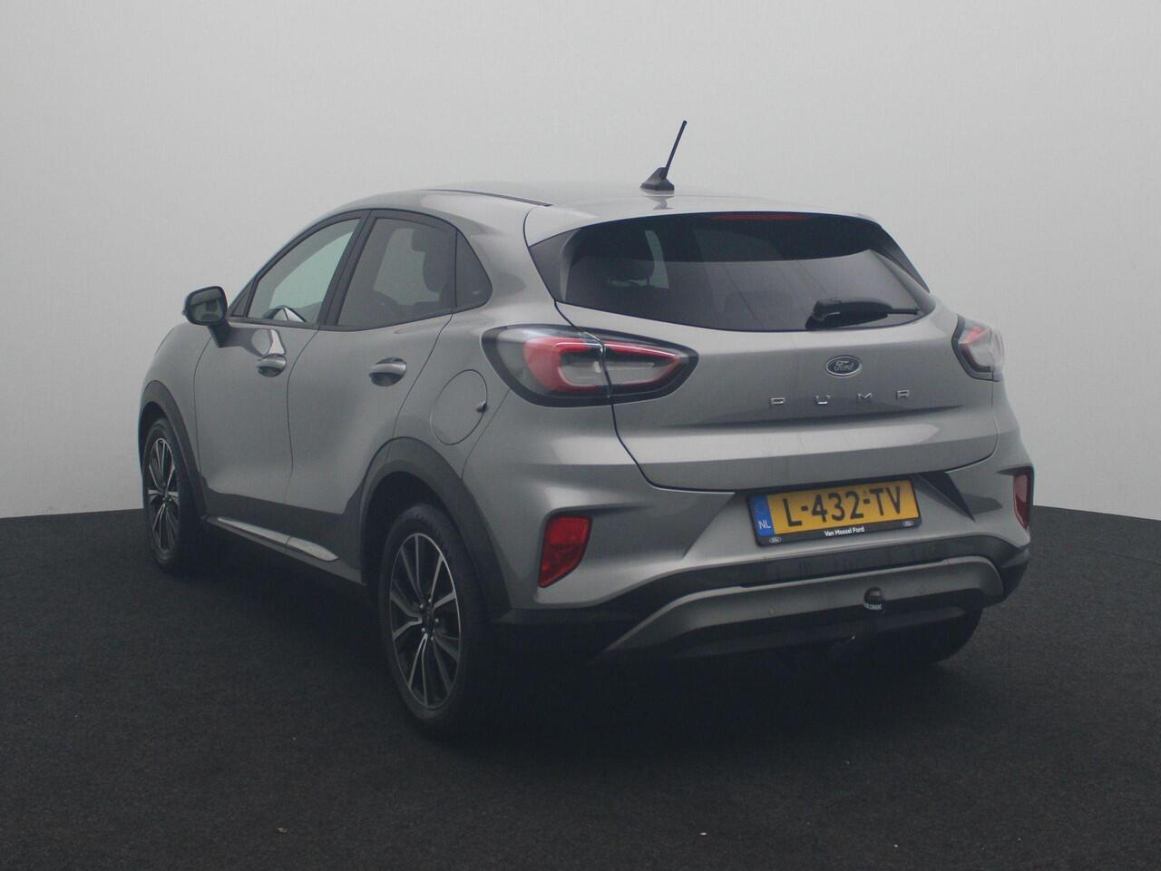 Ford PUMA 1.0 EcoBoost Hybrid Titanium | Navi | AppleCarplay/Android Auto | Parkeersensoren | Stoel+stuurverwarming | Climate control | Trekhaak! |