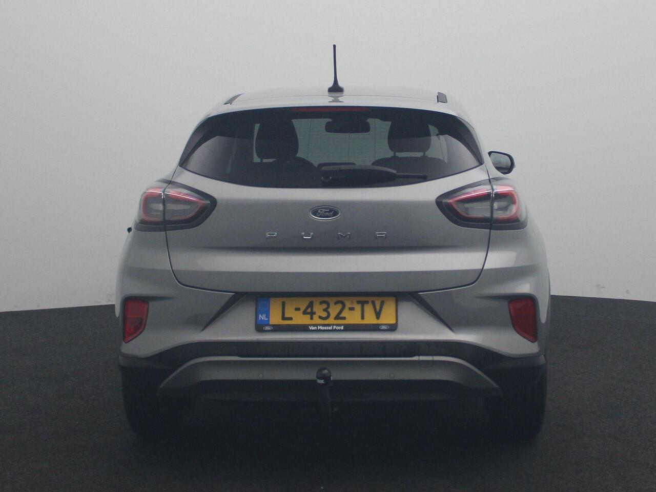 Ford PUMA 1.0 EcoBoost Hybrid Titanium | Navi | AppleCarplay/Android Auto | Parkeersensoren | Stoel+stuurverwarming | Climate control | Trekhaak! |