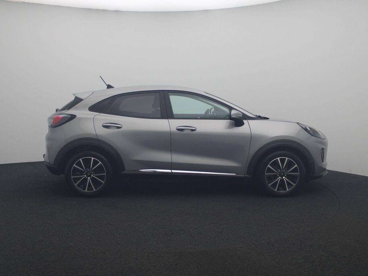 Ford PUMA 1.0 EcoBoost Hybrid Titanium | Navi | AppleCarplay/Android Auto | Parkeersensoren | Stoel+stuurverwarming | Climate control | Trekhaak! |