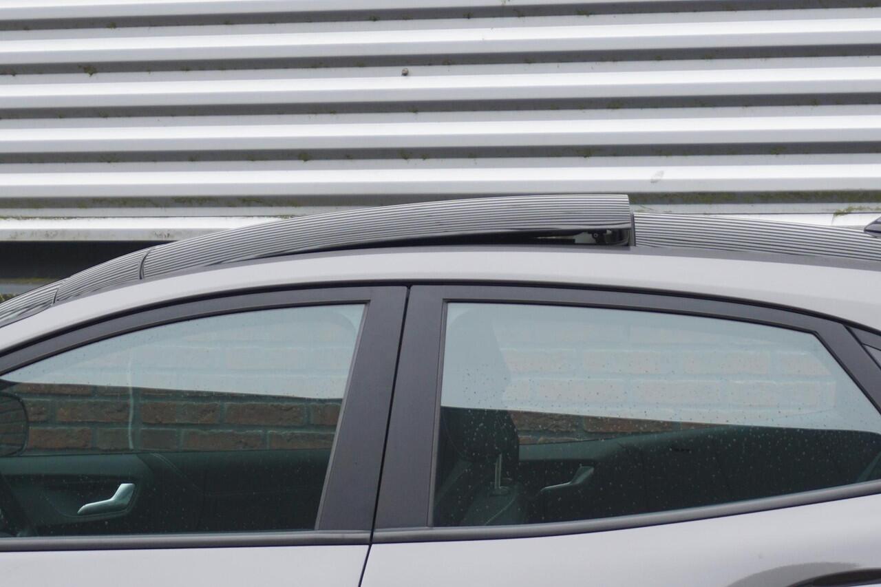 Ford PUMA 1.0 125PKEcoB. Hybrid Titanium/Winterpack/Panodak/ B&O geluidsinstallatie/Trekhaak/All-Seasonbanden.