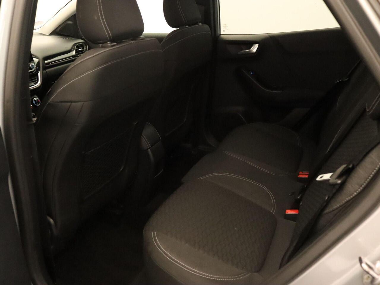 Ford PUMA 1.0 EcoBoost Hybrid Titanium - NAVIGATIE - CLIMATE CONTROL - CRUISE CONTROL - PARKEERSENSOREN ACHTER - LED KOPLAMPEN - MULTIFUNCTIONEEL STUURWIEL - APPLE CARPLAY/ANDROID AUTO - STUUR EN STOEL VERWARMING