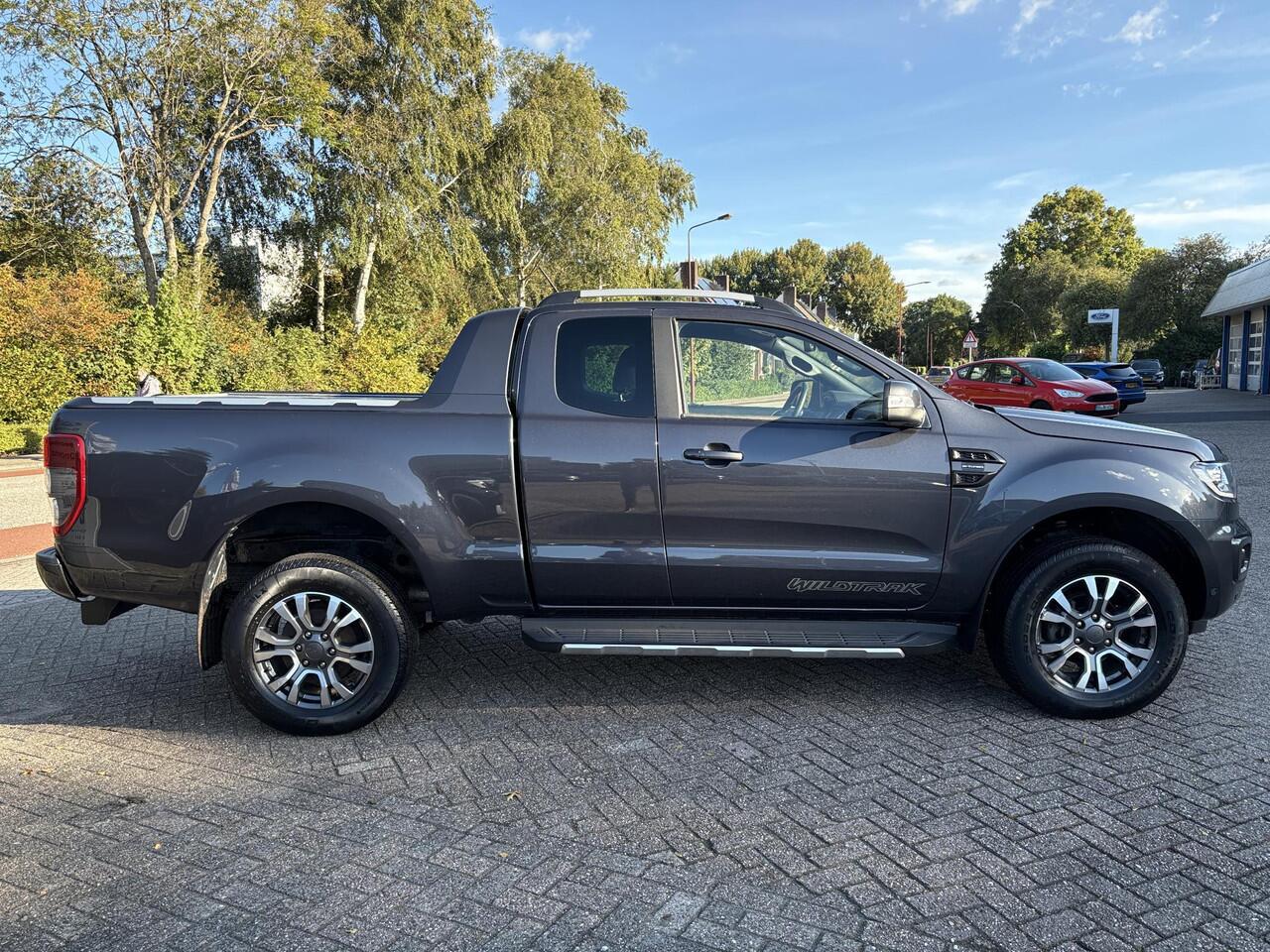 Ford RANGER 2.0 EcoBlue Wildtrak Supercab | Staat bij Schadehersteller | 213pk Automaat | Trekhaak | Adaptieve Cruise | 3.500kg Trekgewicht | Achteruitrijcamera | Rollertop | Dealer onderhouden
