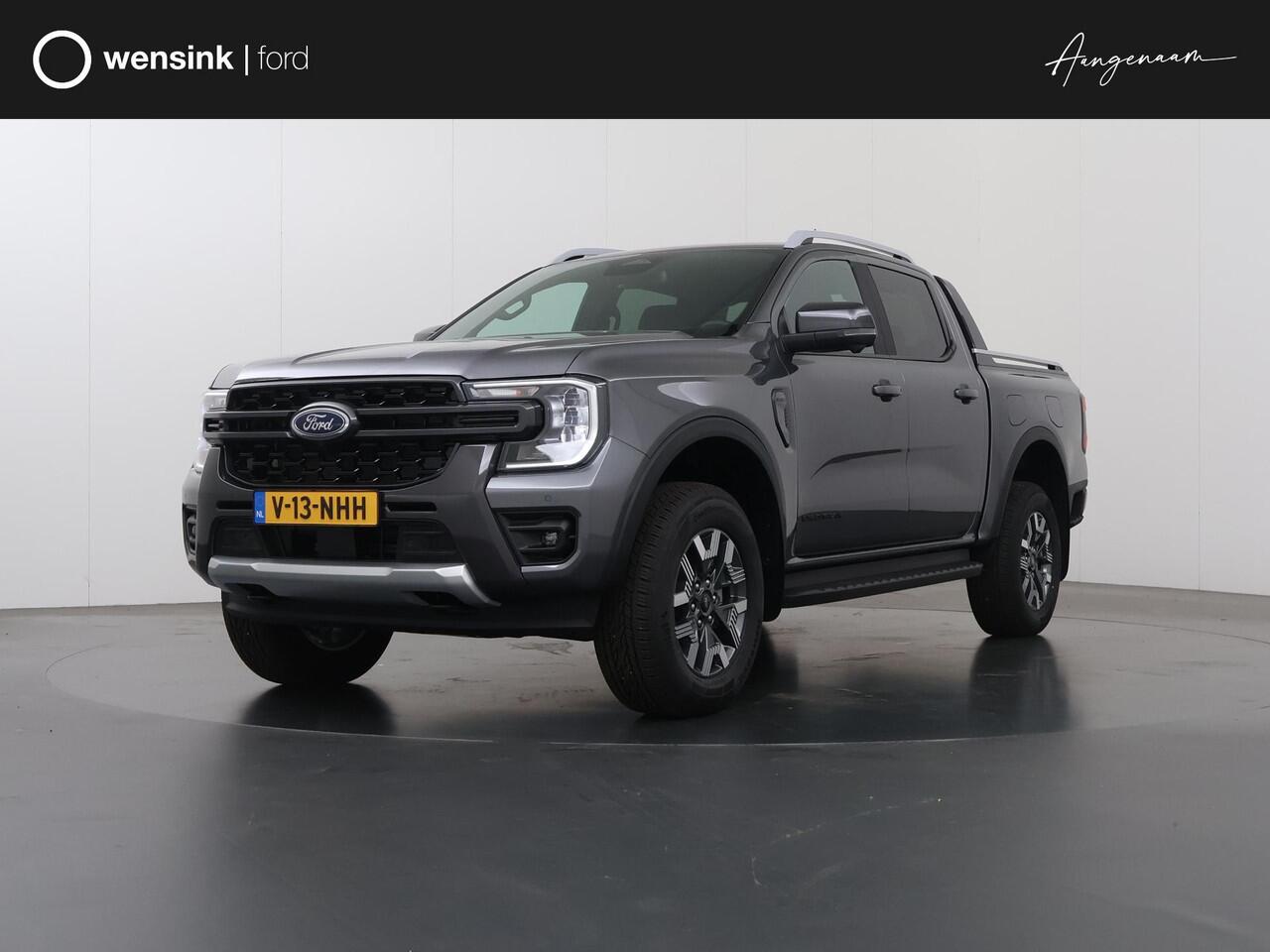 Ford RANGER WILDTRAK | DOUBLE CAB | 2.5 PHEV | HYBRID 5-ZITS | 360 CAMERA | 3500 KG TREKHAAK AFNEEMBAAR | ADAPTIVE CRUISE | BLIND-SPOT | STOELVERWARMING | LEDER | LED | PLUG IN HYBRIDE | METALLIC