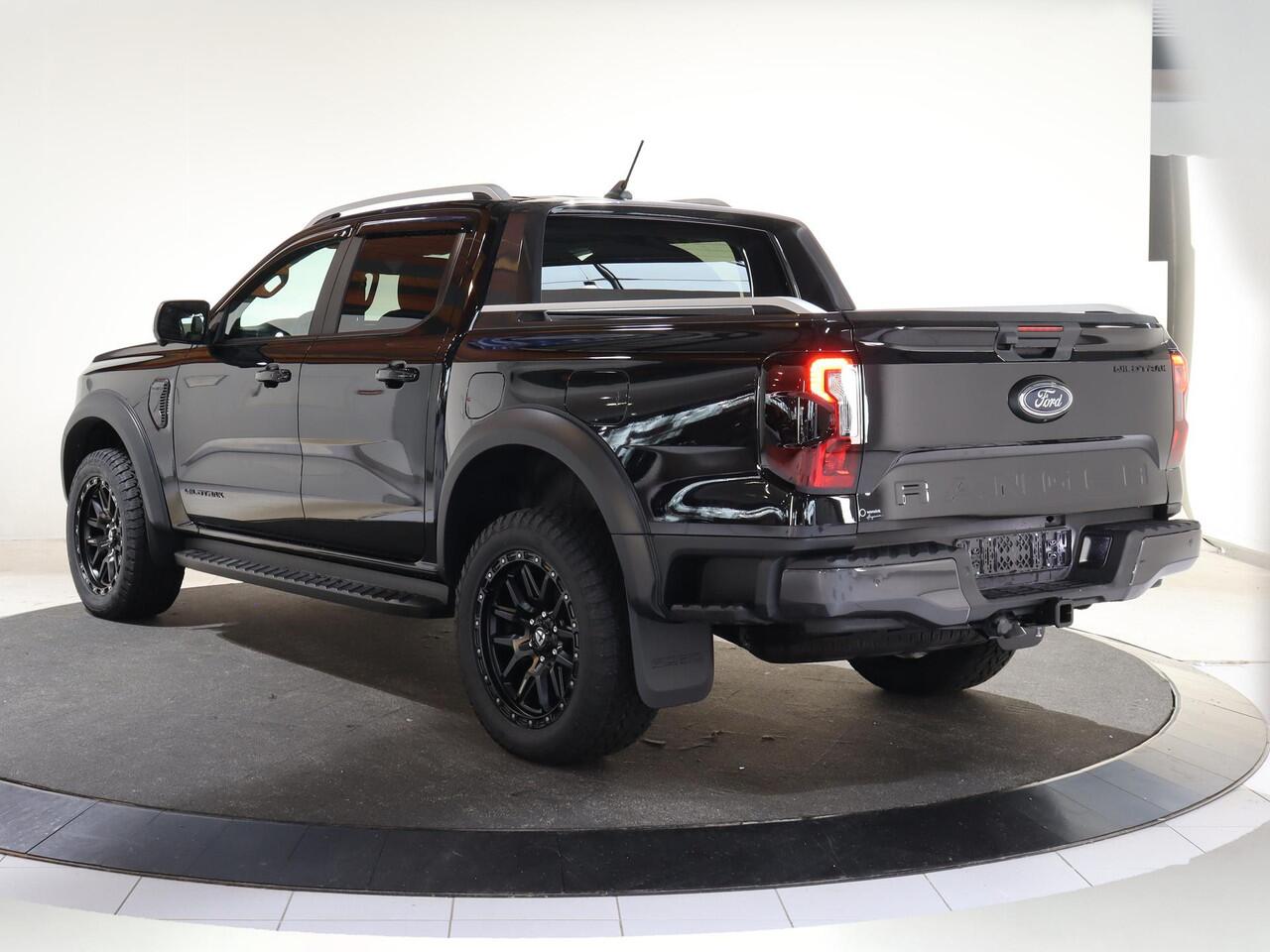 Ford RANGER WILDTRAK | DAKAR EDITITON | 2.3 PHEV | 279 PK | 5-ZITS | 20" TOMASON LICHTMETAAL | ARB LED LIGHTS | 360 CAMERA | 3500 KG TREKHAAK AFNEEMBAAR | ADAPTIVE CRUISE | BLIND-SPOT | STOELVERWARMING | LEDER | LED | PLUG IN HYBRIDE | METALLIC