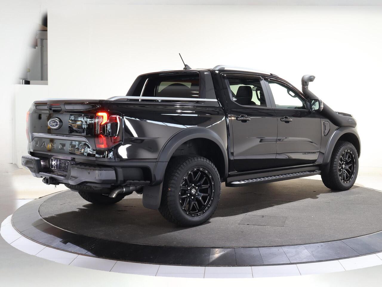 Ford RANGER WILDTRAK | DAKAR EDITITON | 2.3 PHEV | 279 PK | 5-ZITS | 20" TOMASON LICHTMETAAL | ARB LED LIGHTS | 360 CAMERA | 3500 KG TREKHAAK AFNEEMBAAR | ADAPTIVE CRUISE | BLIND-SPOT | STOELVERWARMING | LEDER | LED | PLUG IN HYBRIDE | METALLIC