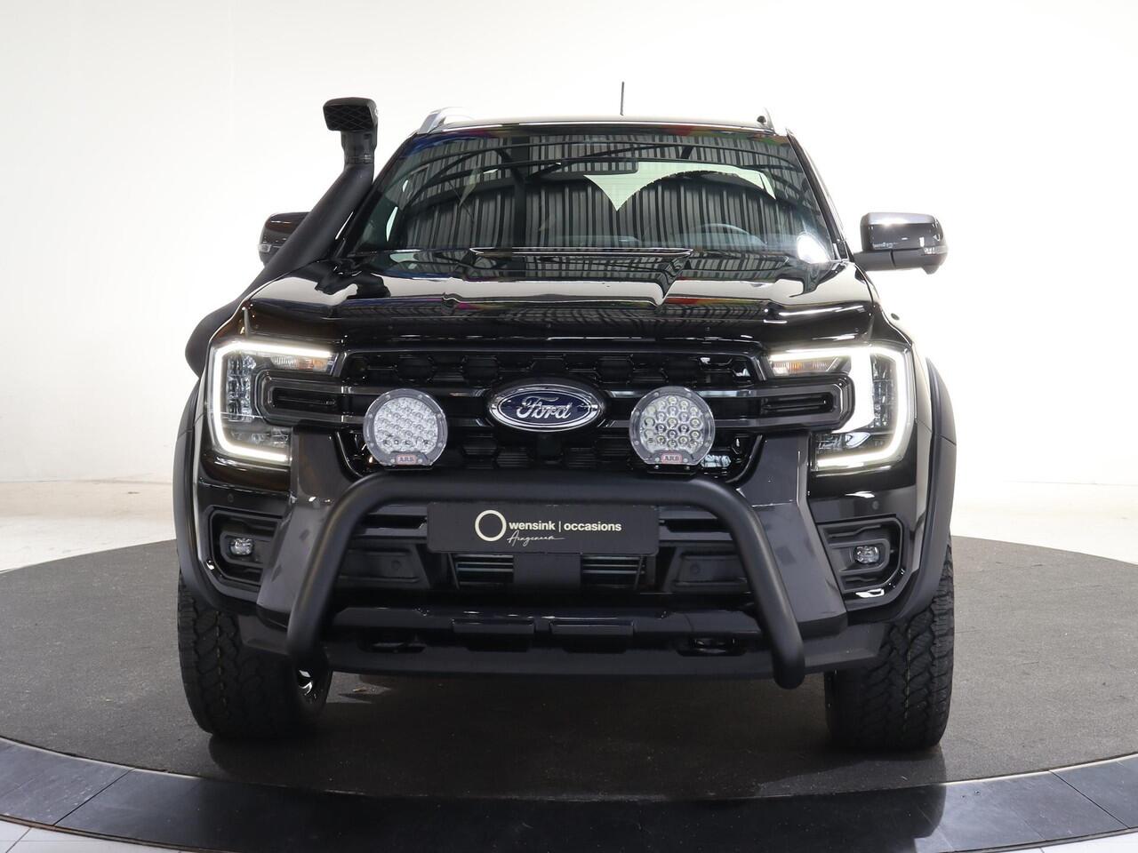 Ford RANGER WILDTRAK | DAKAR EDITITON | 2.3 PHEV | 279 PK | 5-ZITS | 20" TOMASON LICHTMETAAL | ARB LED LIGHTS | 360 CAMERA | 3500 KG TREKHAAK AFNEEMBAAR | ADAPTIVE CRUISE | BLIND-SPOT | STOELVERWARMING | LEDER | LED | PLUG IN HYBRIDE | METALLIC