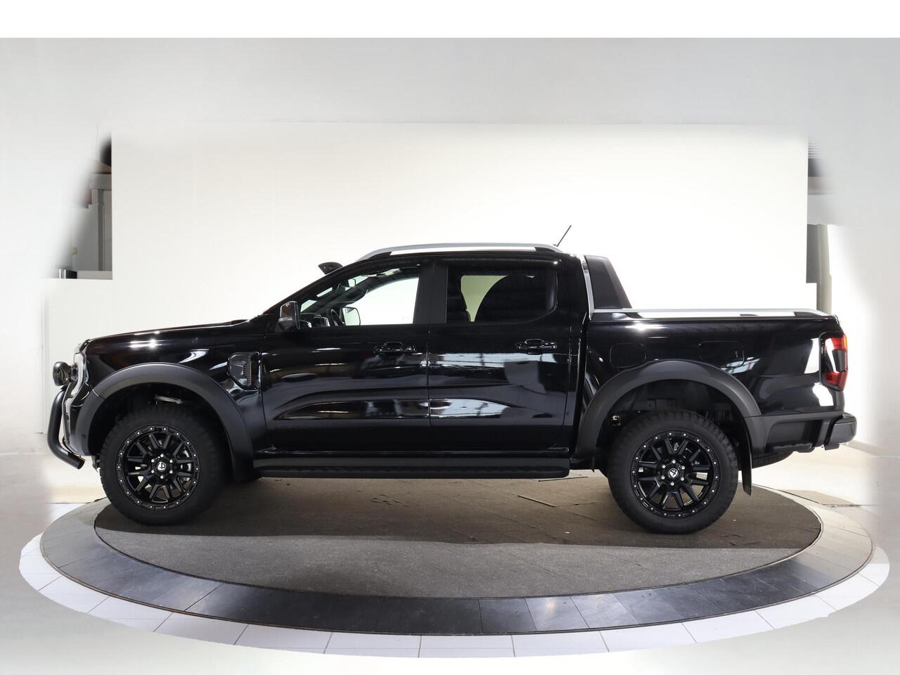 Ford RANGER WILDTRAK | DAKAR EDITITON | 2.3 PHEV | 279 PK | 5-ZITS | 20" TOMASON LICHTMETAAL | ARB LED LIGHTS | 360 CAMERA | 3500 KG TREKHAAK AFNEEMBAAR | ADAPTIVE CRUISE | BLIND-SPOT | STOELVERWARMING | LEDER | LED | PLUG IN HYBRIDE | METALLIC