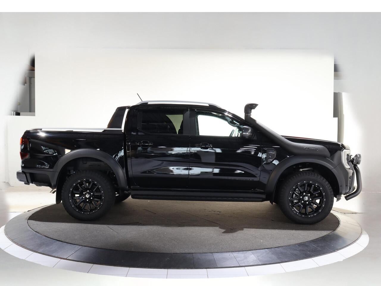 Ford RANGER WILDTRAK | DAKAR EDITITON | 2.3 PHEV | 279 PK | 5-ZITS | 20" TOMASON LICHTMETAAL | ARB LED LIGHTS | 360 CAMERA | 3500 KG TREKHAAK AFNEEMBAAR | ADAPTIVE CRUISE | BLIND-SPOT | STOELVERWARMING | LEDER | LED | PLUG IN HYBRIDE | METALLIC