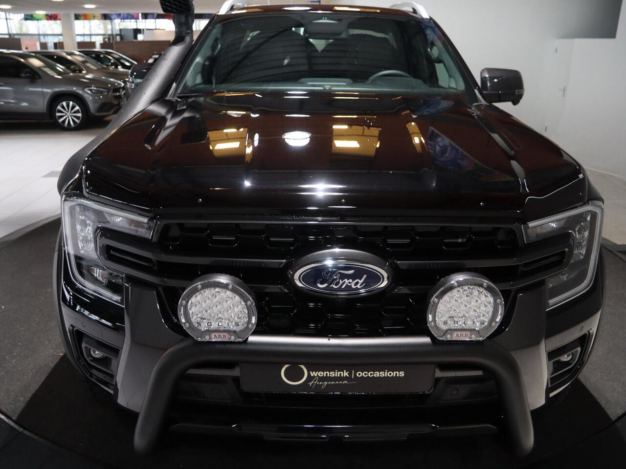 Ford RANGER WILDTRAK | DAKAR EDITITON | 2.3 PHEV | 279 PK | 5-ZITS | 20" TOMASON LICHTMETAAL | ARB LED LIGHTS | 360 CAMERA | 3500 KG TREKHAAK AFNEEMBAAR | ADAPTIVE CRUISE | BLIND-SPOT | STOELVERWARMING | LEDER | LED | PLUG IN HYBRIDE | METALLIC