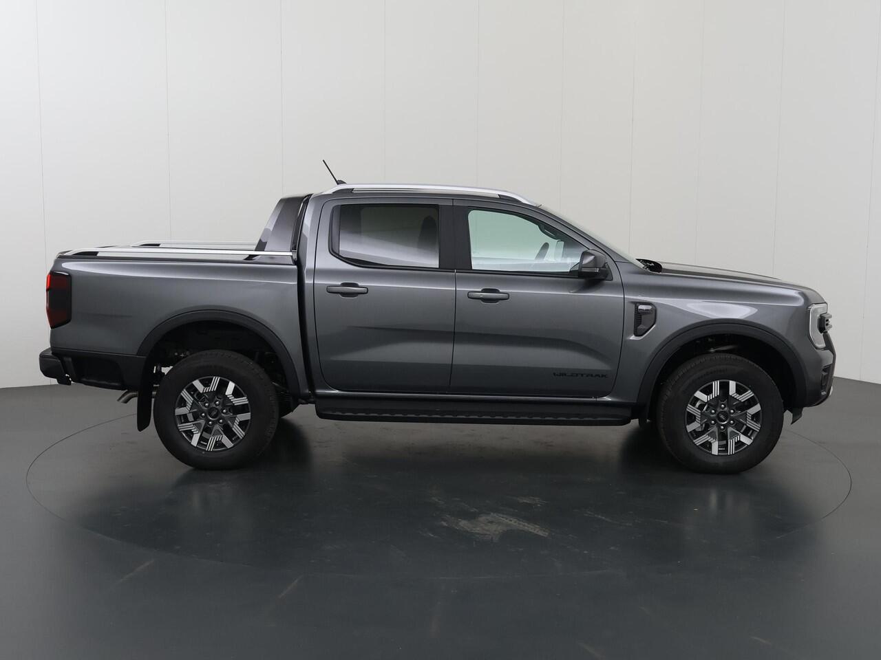 Ford RANGER WILDTRAK | DOUBLE CAB | 2.5 PHEV | HYBRID | 279 PK | 5-ZITS | 360 CAMERA | 3500 KG TREKHAAK AFNEEMBAAR | ADAPTIVE CRUISE | BLIND-SPOT | STOELVERWARMING | LEDER | LED | PLUG IN HYBRIDE | METALLIC