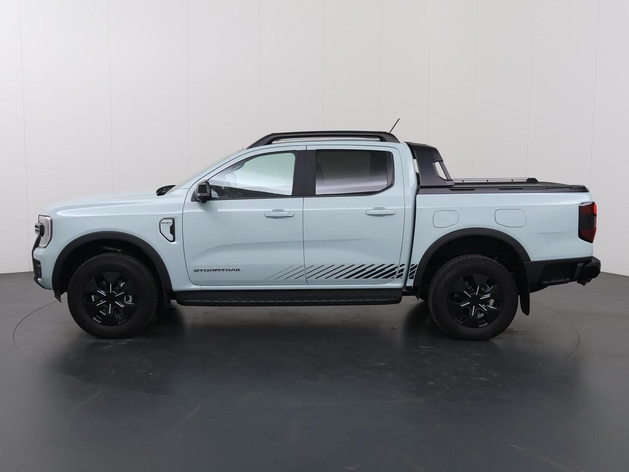 Ford RANGER Stormtrak 2.3 PHEV | 279 PK | DOUBLE CAB | NL AUTO | PRO POWER ONBOARD 2.3 kWh | 360 CAMERA | 3500 KG TREKHAAK | ADAPTIEVE CRUISE | LEREN BEKLEDING | NAVIGATIE | STOELVERWARMING | STUURWIELVERWARMING | ELEKRISCHE ROLLER-TOP