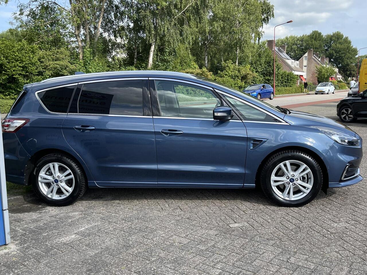 Ford S-MAX 2.5 FHEV Titanium 190pk | 7 Persoons | Winterpack | Adaptieve Cruise | Full LED | Elek. Achterklep | Achteruitrijcamera | SONY SYNC 3 Navigatie