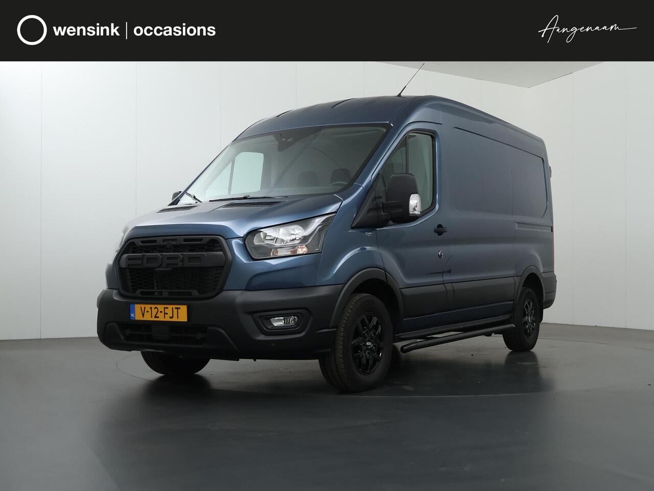 Ford TRANSIT 330 | 2.0 TDCI | L2 H2 | TREND | 170 PK | STOELVERWARMING | RAPTOR GRILLE | TRAIL VELGEN | PARKEERSENSOREN | TREKHAAK | DAB + | AIRCO | CRUISE CONTROL | METALLIC | NL | DEALER ONDERHOUDEN