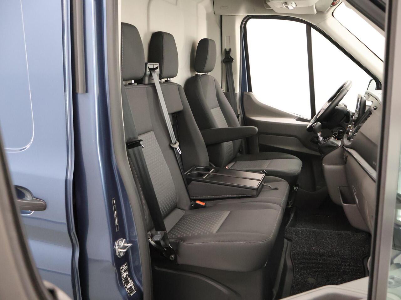 Ford TRANSIT 330 | 2.0 TDCI | L2 H2 | TREND | 170 PK | STOELVERWARMING | RAPTOR GRILLE | TRAIL VELGEN | PARKEERSENSOREN | TREKHAAK | DAB + | AIRCO | CRUISE CONTROL | METALLIC | NL | DEALER ONDERHOUDEN