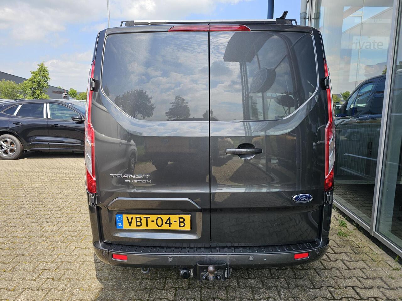 Ford TRANSIT CUSTOM 320 2.0 TDCI L2H1 Sport 185 pk Automaat | Cruise control | Navigatie | Lane assist | Half leder | Stoelverwarming | Airco | Trekhaak | Zéér compleet!