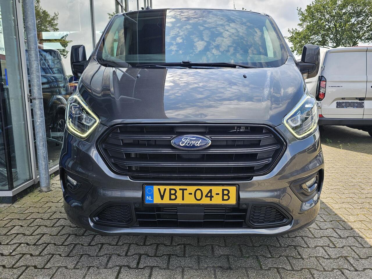 Ford TRANSIT CUSTOM 320 2.0 TDCI L2H1 Sport 185 pk Automaat | Cruise control | Navigatie | Lane assist | Half leder | Stoelverwarming | Airco | Trekhaak | Zéér compleet!