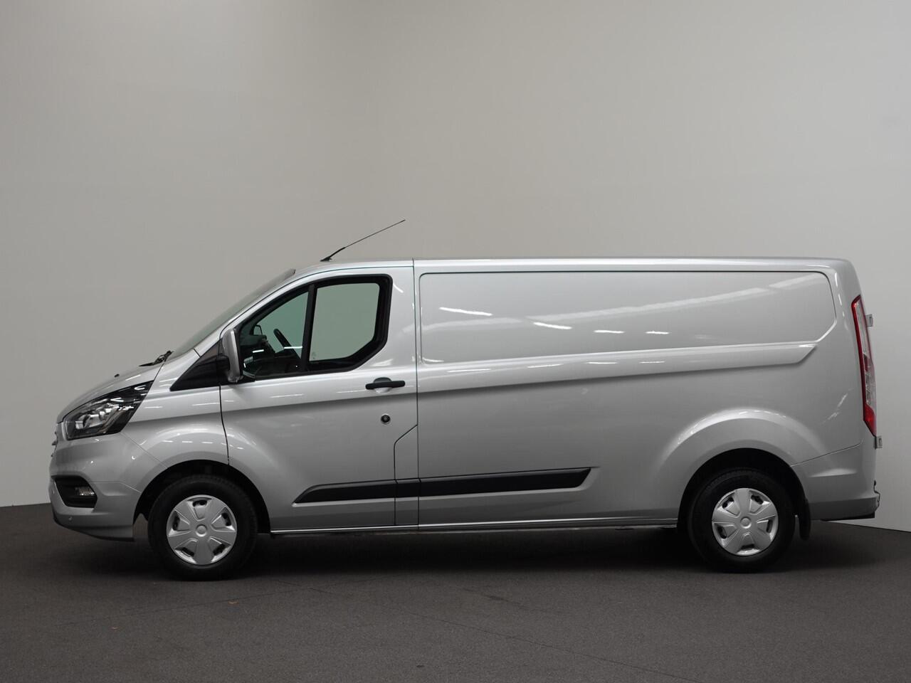 Ford TRANSIT CUSTOM 131pk L2H1 Trend Trekhaak Camera Cruise control Airco Parkeersensoren 3-Zits Euro6