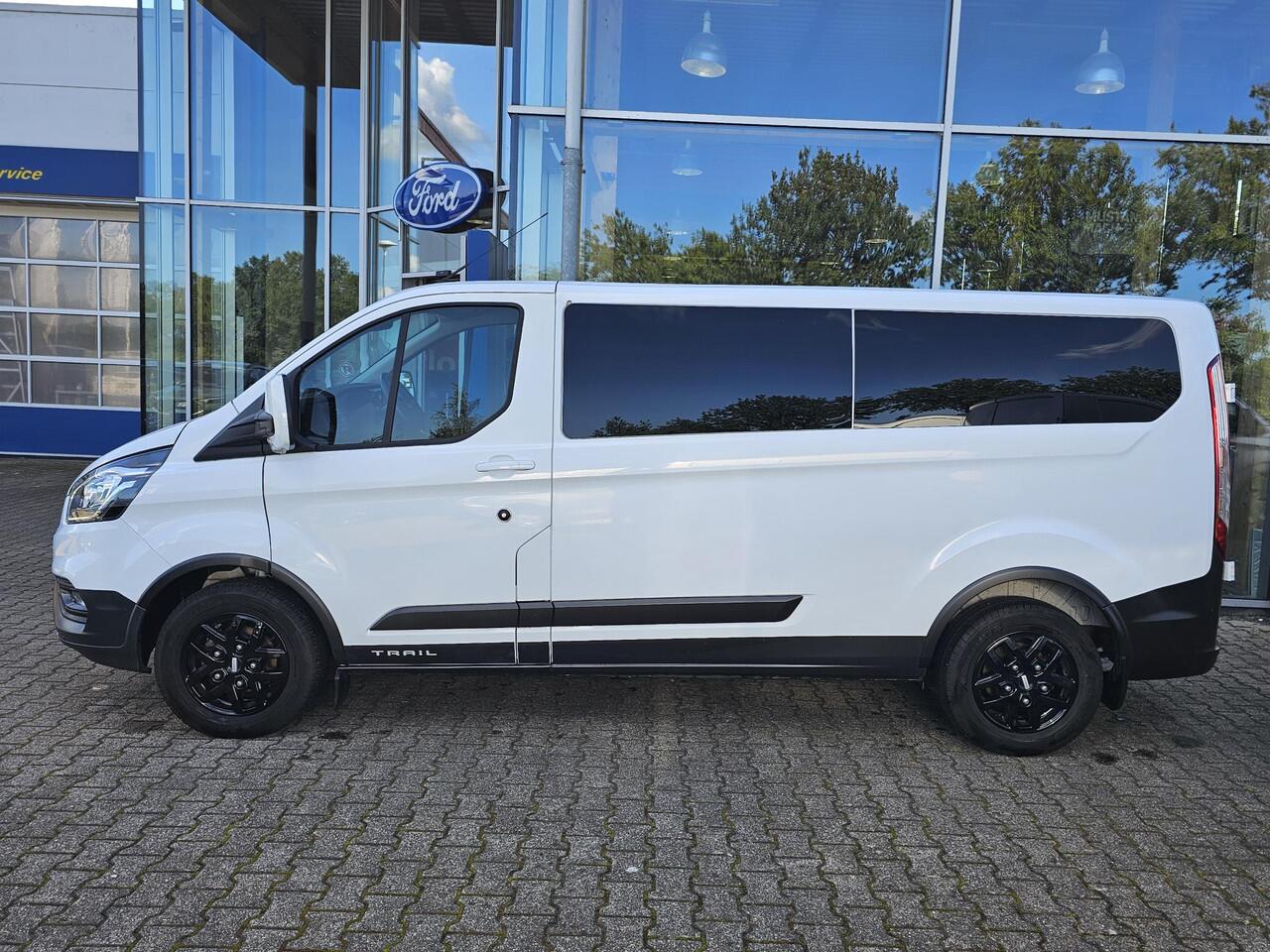 Ford TRANSIT CUSTOM 300 2.0 TDCI L2H1 Trail | Glasslook panelen | Raptor grille | Camera | Trekhaak | Leder | Voorruitverwarming | Airco | Cruise control etc.